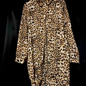 Leopard print Button down mid-length dress or top.